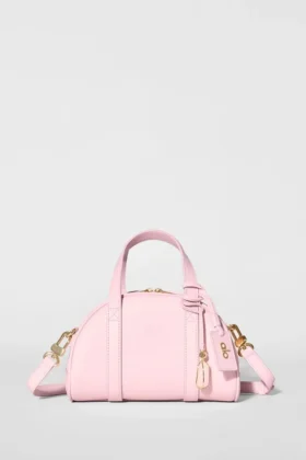 Alo Mini Odyssey – sonnenverwöhntes rosa Leder
