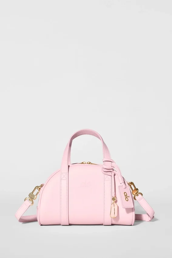 Alo Mini Odyssey – sonnenverwöhntes rosa Leder