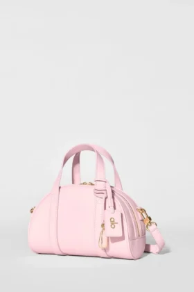 Alo Mini Odyssey – sonnenverwöhntes rosa Leder