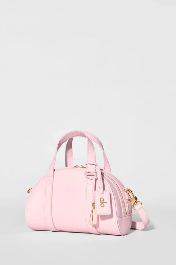 Alo Mini Odyssey – sonnenverwöhntes rosa Leder