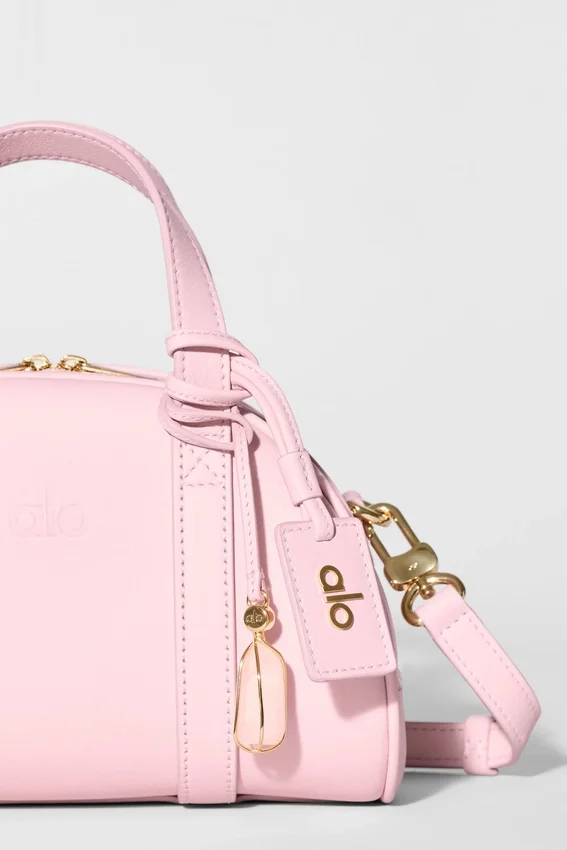Alo Mini Odyssey – sonnenverwöhntes rosa Leder