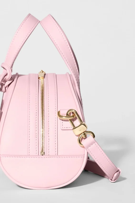 Alo Mini Odyssey – sonnenverwöhntes rosa Leder