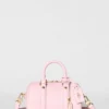 Alo Mini Voyage – sonnenverwöhntes rosa Leder