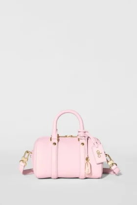 Alo Mini Voyage – sonnenverwöhntes rosa Leder