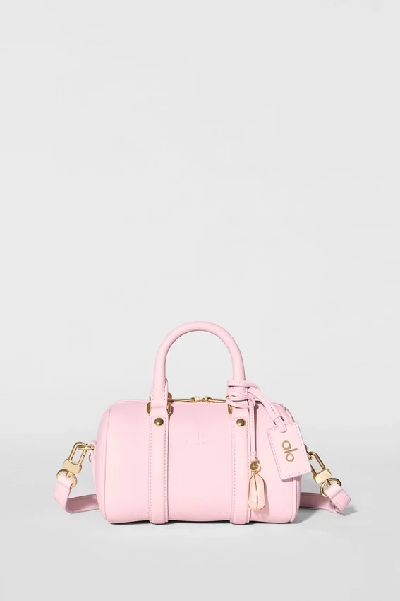 Alo Mini Voyage – sonnenverwöhntes rosa Leder