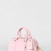 Alo Mini Voyage – sonnenverwöhntes rosa Leder