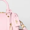 Alo Mini Voyage – sonnenverwöhntes rosa Leder