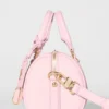 Alo Mini Voyage – sonnenverwöhntes rosa Leder