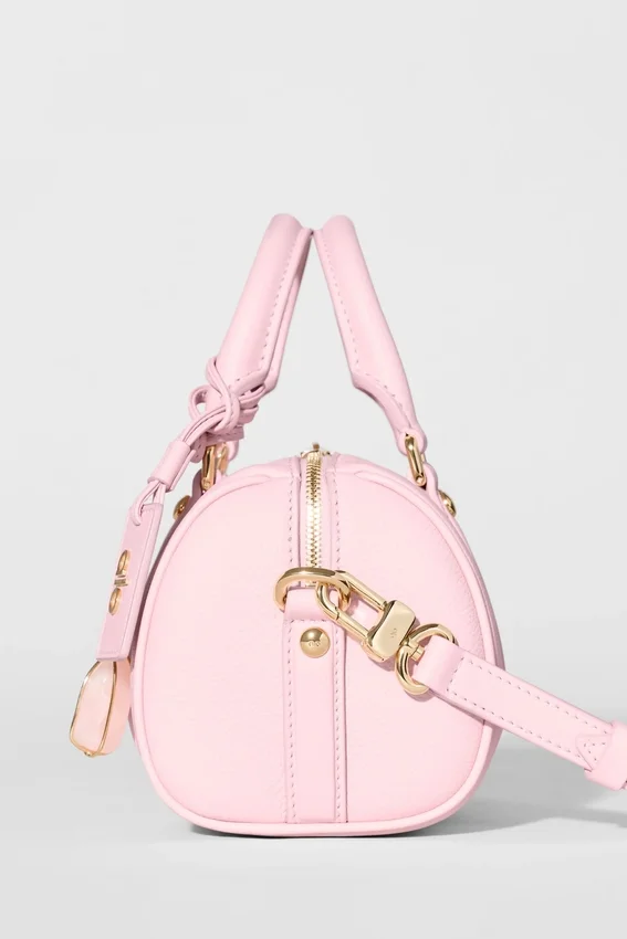 Alo Mini Voyage – sonnenverwöhntes rosa Leder