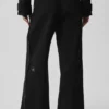 Cosmopolitan-Hose mit mittlerer Leibhöhe und Druckknöpfen – Schwarz