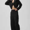 Cosmopolitan-Hose mit mittlerer Leibhöhe und Druckknöpfen – Schwarz
