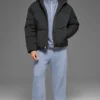 Crinkle-Nylon-Bühnensteppjacke mit Kapuze – Schwarz