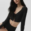 Gerippte, kurz geschnittene „Whisper“-Strickjacke – Schwarz