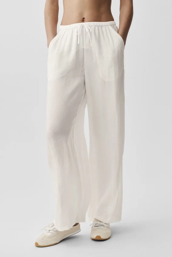 Halbtransparente „Golden Hour“-Hose mit High-Waist und geradem Bein – Elfenbein