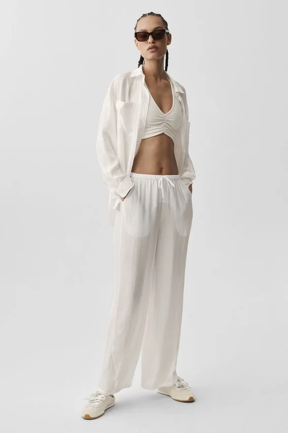 Halbtransparente „Golden Hour“-Hose mit High-Waist und geradem Bein – Elfenbein