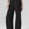 Halbtransparente, zarte Lounge-Hose mit ausgestelltem Bein – Schwarz