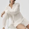 Halbtransparentes „Golden Hour“-Langarmshirt mit Knöpfen – Elfenbein