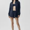 Halbtransparentes „Golden Hour“-Langarmshirt mit Knöpfen – Marineblau