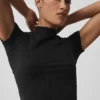 Nahtloses Pointelle-Shirt mit Stehkragen und Kurzarmshirts – Schwarz