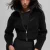 Sherpa-Jacke mit seitlichem Schlitz – Schwarz
