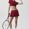 Tennisrock „Amp It up“ mit niedriger Leibhöhe – Summer Romance Red