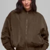 Urbanite-Bomberjacke aus Kunstfell – Espresso/Elfenbein