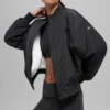 Urbanite-Bomberjacke aus Kunstfell – Schwarz/Elfenbein