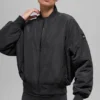 Urbanite-Bomberjacke aus Kunstfell – Schwarz/Elfenbein